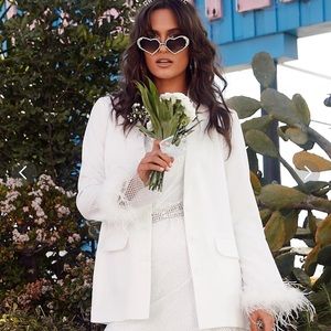 White feather trimmed 12th tribe blazer